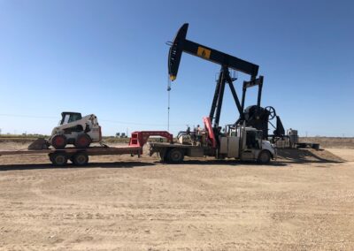 Completed Unit Set of PPJS Unit - Prairie Gold Truck, Trailer, and Bobcat - Prairie Gold Pumpjack Services