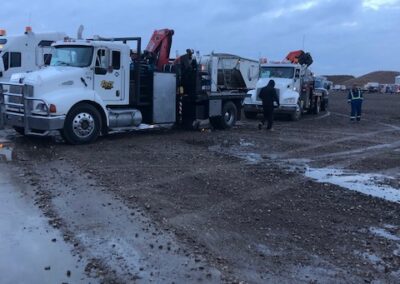 Prairie Gold 3-ton trucks with knuckle cranes - Prairie Gold Pumpjack Services